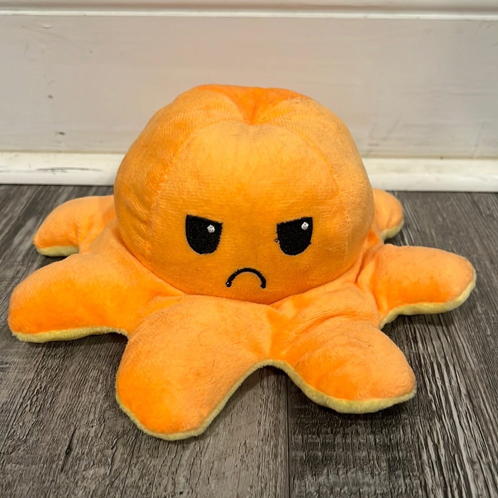 yellow and orange angry octopus, been stored away, want to get rid of it